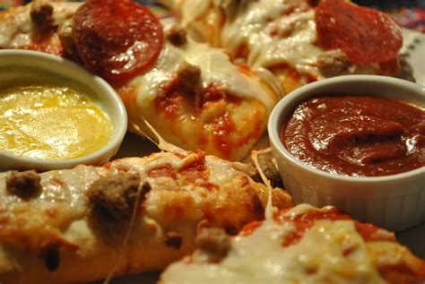 How many protein are in pizza dipping strips three meat pizza - calories, carbs, nutrition