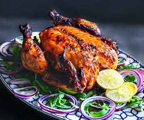 How many protein are in pizzetta whole wheat chicken tandoori 1/2 ea - calories, carbs, nutrition