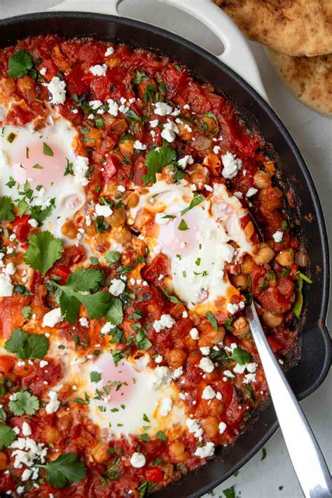 How many protein are in poached eggs in tomato with chickpea and feta - calories, carbs, nutrition