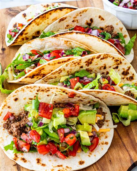 How many protein are in restaurant, mexican, soft taco with ground beef, cheese and lettuce - calories, carbs, nutrition