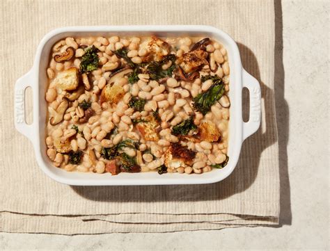 How many protein are in roasted chicken over white bean cassoulet and sauteed spinach - calories, carbs, nutrition