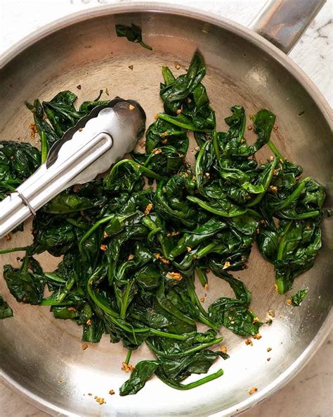 How many protein are in sauteed spinach w/garlic & pine - calories, carbs, nutrition