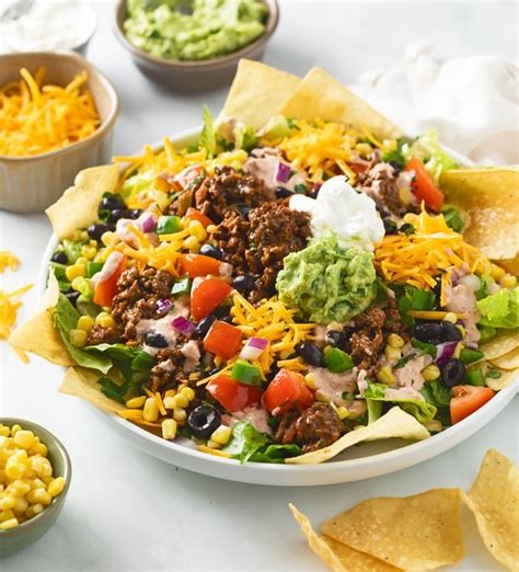 How many protein are in sizzling taco chip salad - calories, carbs, nutrition