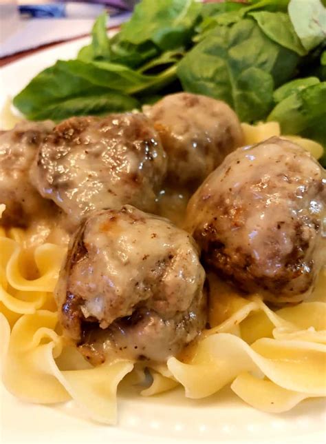 How many protein are in swedish meatballs over egg noodles with dinner roll and sour cream - calories, carbs, nutrition