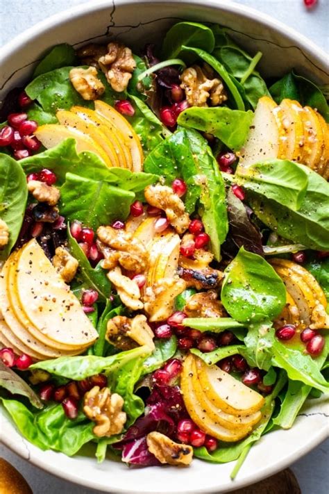 How many protein are in tender greens, pear, walnut, pomegranate seeds, raspberry vinaigrette - calories, carbs, nutrition