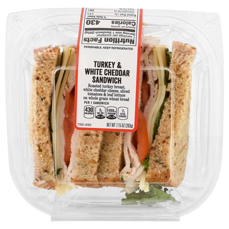 How many protein are in turkey deli sandwich w/cheese on white bread - calories, carbs, nutrition