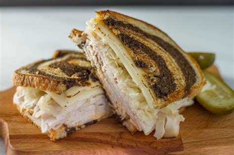 How many protein are in turkey rueben panini - calories, carbs, nutrition