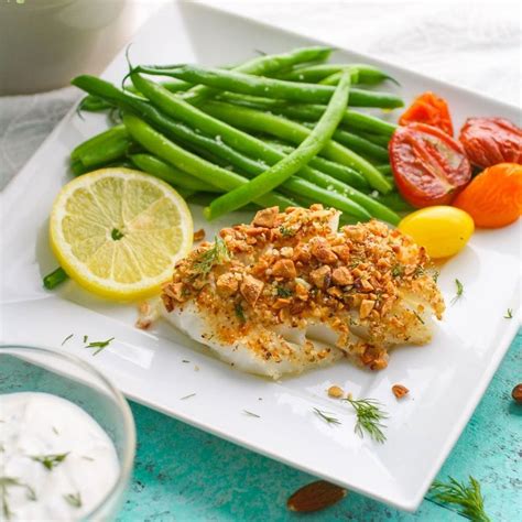 How many protein are in vw-baked cod dijon, almond quinoa edamame herb roasted tomatoes - calories, carbs, nutrition