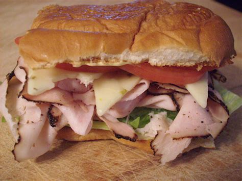 How many protein are in zesty turkey pastrami sandwich, on roll - calories, carbs, nutrition