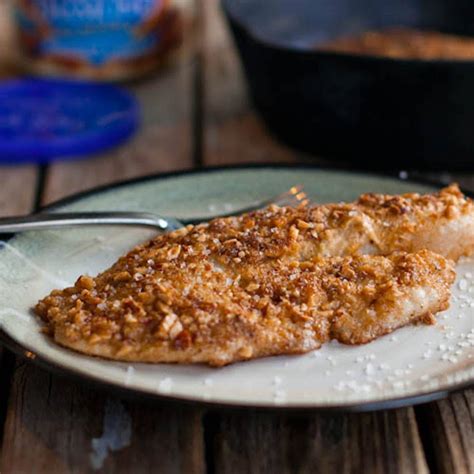 How many sugar are in almond crusted tilapia with red pepper confit, broccolini and sweet potato gratin - calories, carbs, nutrition