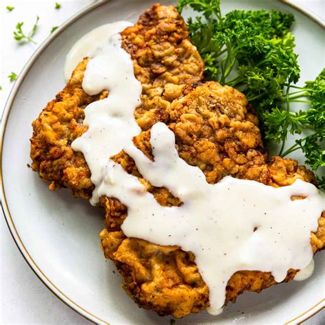 How many sugar are in beef chicken fried steak with old bay cream gravy - calories, carbs, nutrition