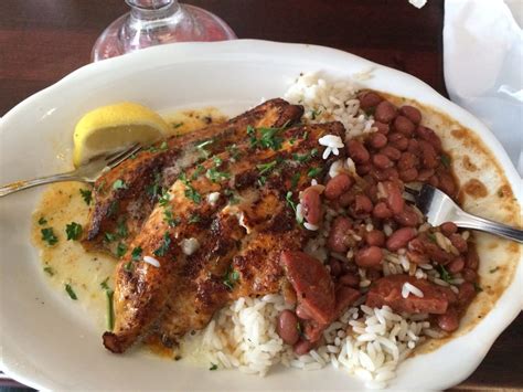 How many sugar are in blackened catfish with red beans and rice andouille sausage with spinach with roasted red peppers - calories, carbs, nutrition