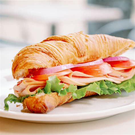 How many sugar are in breakfast turkey croissant sandwich - calories, carbs, nutrition