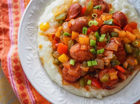 How many sugar are in cajun style chicken and andouille sausage over grits with red eye gravy - calories, carbs, nutrition