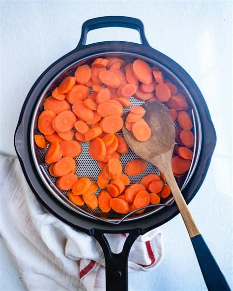 How many sugar are in carrots steamed 4 oz - calories, carbs, nutrition