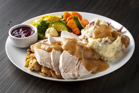 How many sugar are in carved turkey breast dinner with brioche stuffing - calories, carbs, nutrition