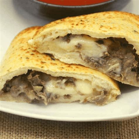 How many sugar are in cheesesteak calzone - calories, carbs, nutrition