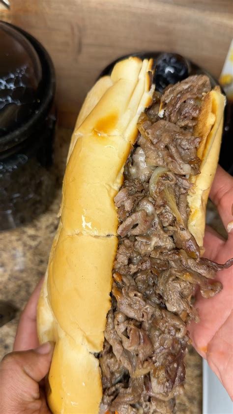 How many sugar are in cheesesteak with peppers and onions - calories, carbs, nutrition