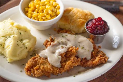 How many sugar are in chicken fried chicken with country gravy - calories, carbs, nutrition