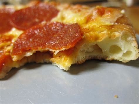 How many sugar are in digiorno pizza, cheese topping, cheese stuffed crust, frozen, baked - calories, carbs, nutrition