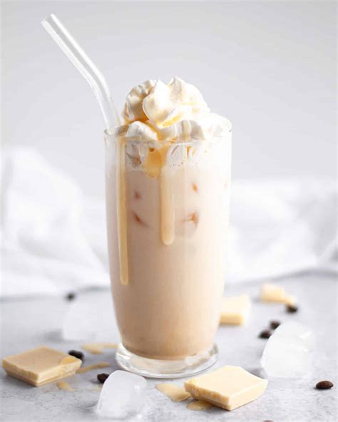 How many sugar are in iced white chocolate mocha - grande - 2% milk - with whipped cream - calories, carbs, nutrition