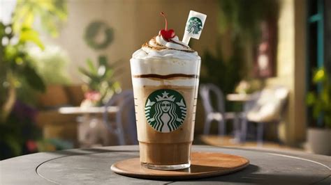 How many sugar are in iced white chocolate mocha - venti - soy milk - with whipped cream - calories, carbs, nutrition