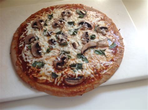 How many sugar are in mushroom pizza wheat crust - calories, carbs, nutrition