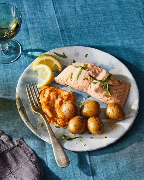 How many sugar are in olive oil poached salmon with orange broth, white bean kale, blistered tomato - calories, carbs, nutrition