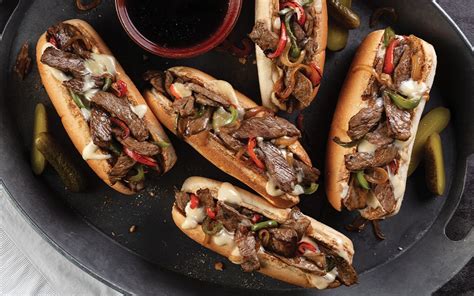 How many sugar are in philly cheese steak withsauteed onions peppers withpotato salad - calories, carbs, nutrition