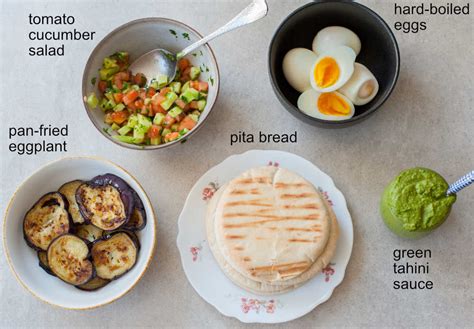 How many sugar are in pita with eggplant and tomato sandwich - calories, carbs, nutrition