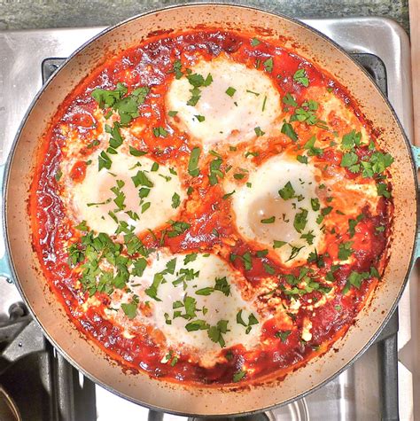 How many sugar are in poached eggs in tomato with chickpea and feta - calories, carbs, nutrition