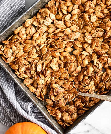 How many sugar are in pumpkin seeds (roasted & salted) - calories, carbs, nutrition