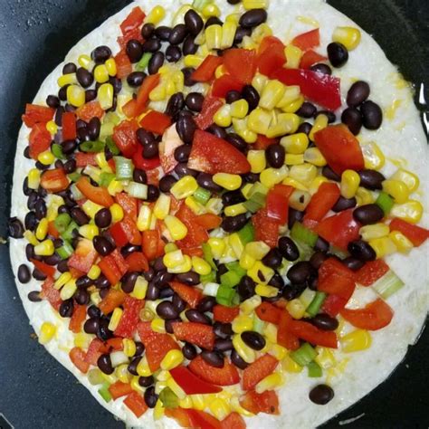 How many sugar are in quesadilla black beans santa fe pepper jack 10