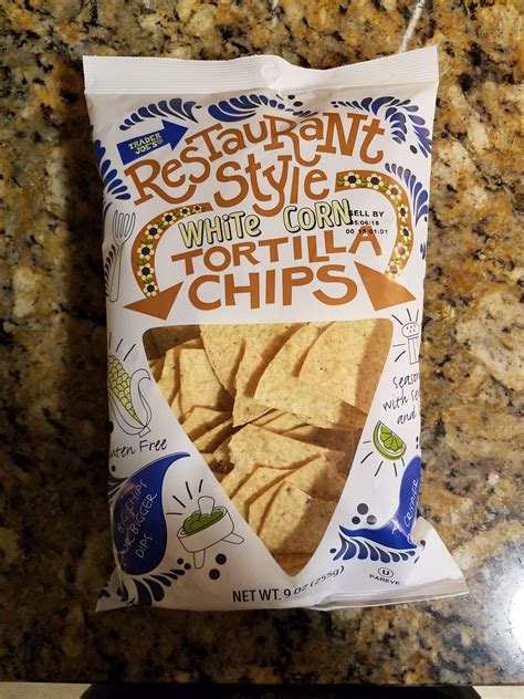 How many sugar are in restaurant style white corn tortilla chips - calories, carbs, nutrition