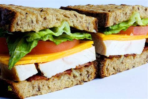 How many sugar are in roast turkey romaine & cranberry orange mayo on wheat bread (111935.2) - calories, carbs, nutrition