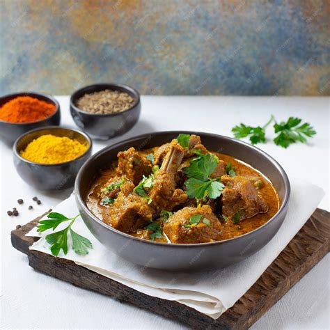 How many sugar are in slow cooked tender pieces of lamb in an authentic rogan josh sauce - calories, carbs, nutrition