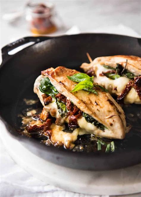 How many sugar are in stuffed chicken breast withspinach, sun-dried tomatoes and goat cheese-occ - calories, carbs, nutrition