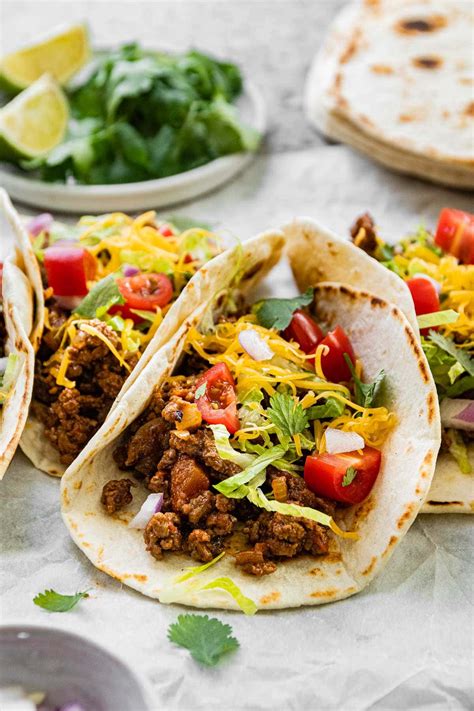 How many sugar are in taco beef soft tacos w/sour cream - calories, carbs, nutrition