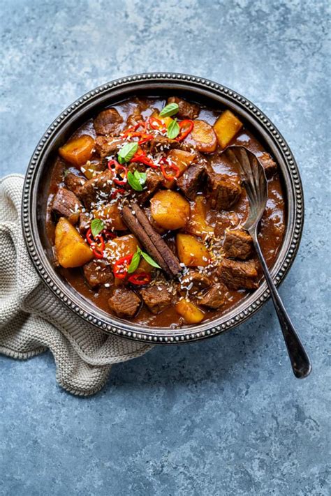 How many sugar are in tagine coconut beef curry with summer vegetable and saffron brown rice paella - calories, carbs, nutrition