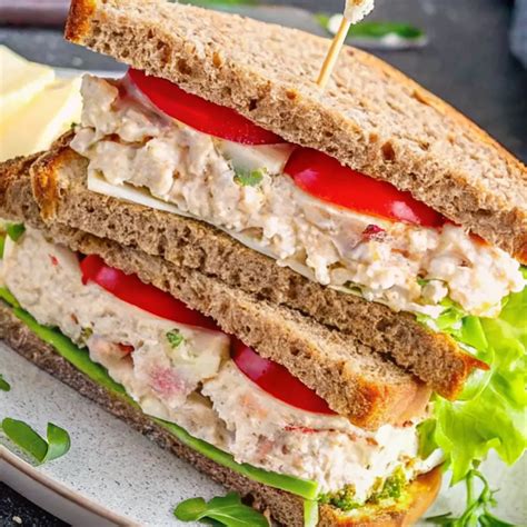 How many sugar are in tuna sandwich on white, acc-st - calories, carbs, nutrition