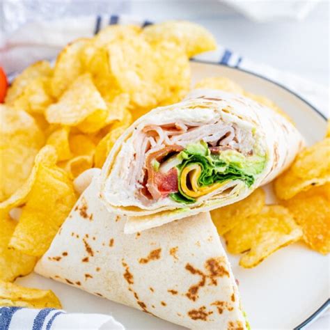 How many sugar are in turkey and american cheese wrap withpotato salad - calories, carbs, nutrition