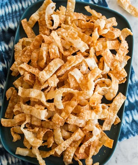 How many sugar are in wonton strips fried 1 oz - calories, carbs, nutrition