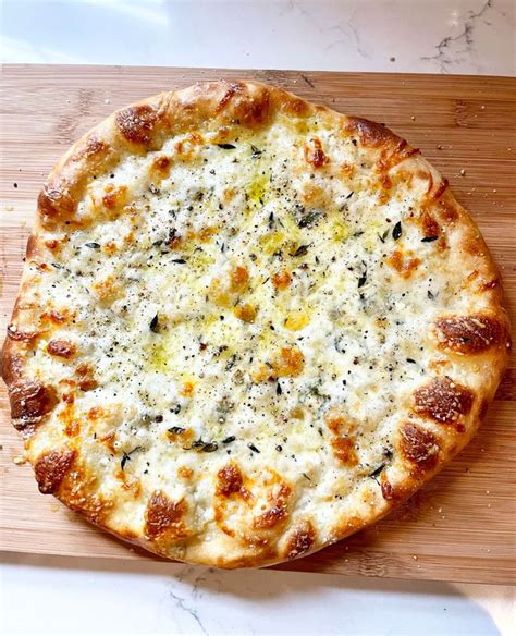 How much fat is in 2 x 4 cheese pizza (16123.2) - calories, carbs, nutrition