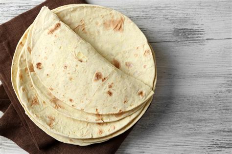 How much fat is in 55% whole grain flour tortilla (70256.0) - calories, carbs, nutrition