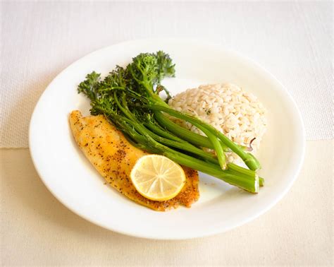 How much fat is in almond crusted tilapia with red pepper confit, broccolini and sweet potato gratin - calories, carbs, nutrition