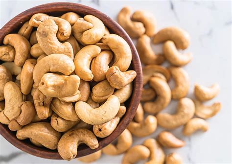 How much fat is in cashews oil roasted unsalted 1 tbsp - calories, carbs, nutrition