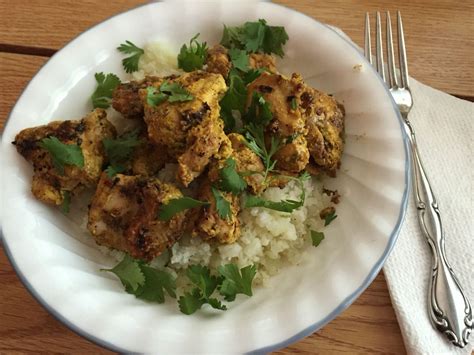 How much fat is in chicken thigh tikka skewer pulai rice cardamom cauliflower & kachoombar salad - calories, carbs, nutrition