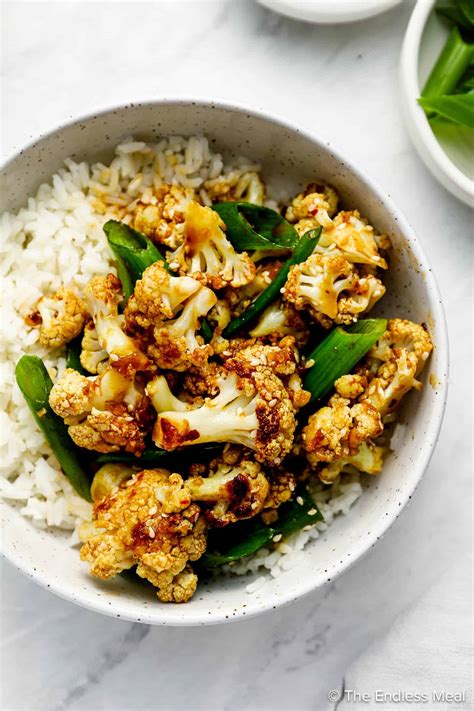 How much fat is in general tso cauliflower with rice and vegetarian egg roll - calories, carbs, nutrition
