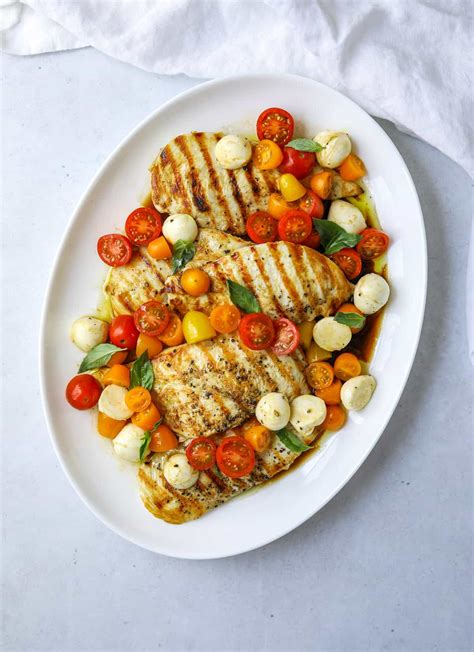 How much fat is in grilled balsamic herb marinated chicken breast topped with golden tomato caaponata - calories, carbs, nutrition