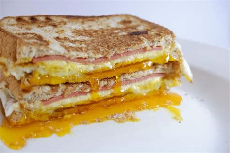 How much fat is in ham, egg, cheese on wheat toast - calories, carbs, nutrition